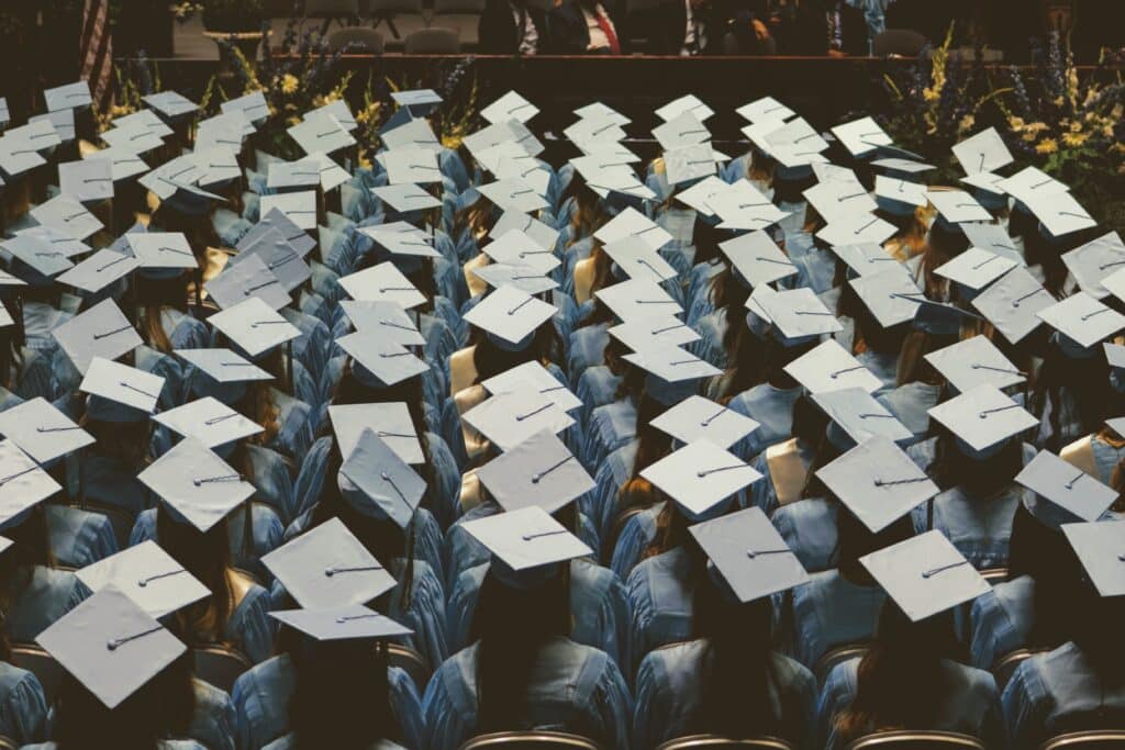 Aerial view of students lined up in graduation caps and gowns