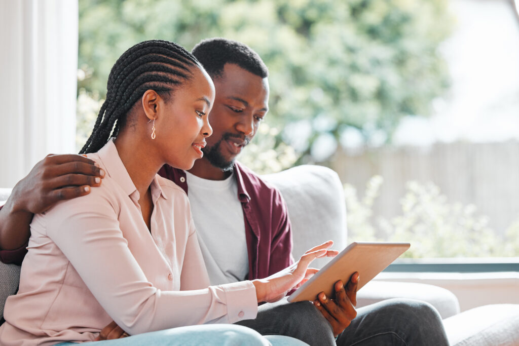 A couple reviews a life insurance policy.