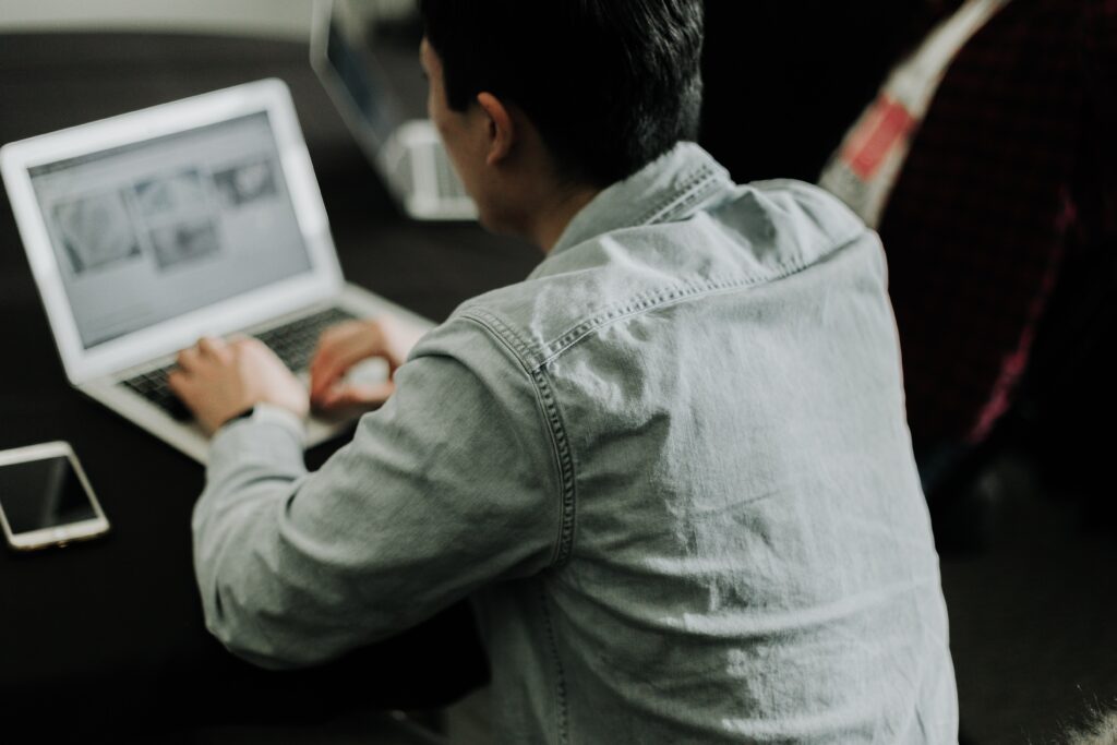 Person doing research on a laptop
