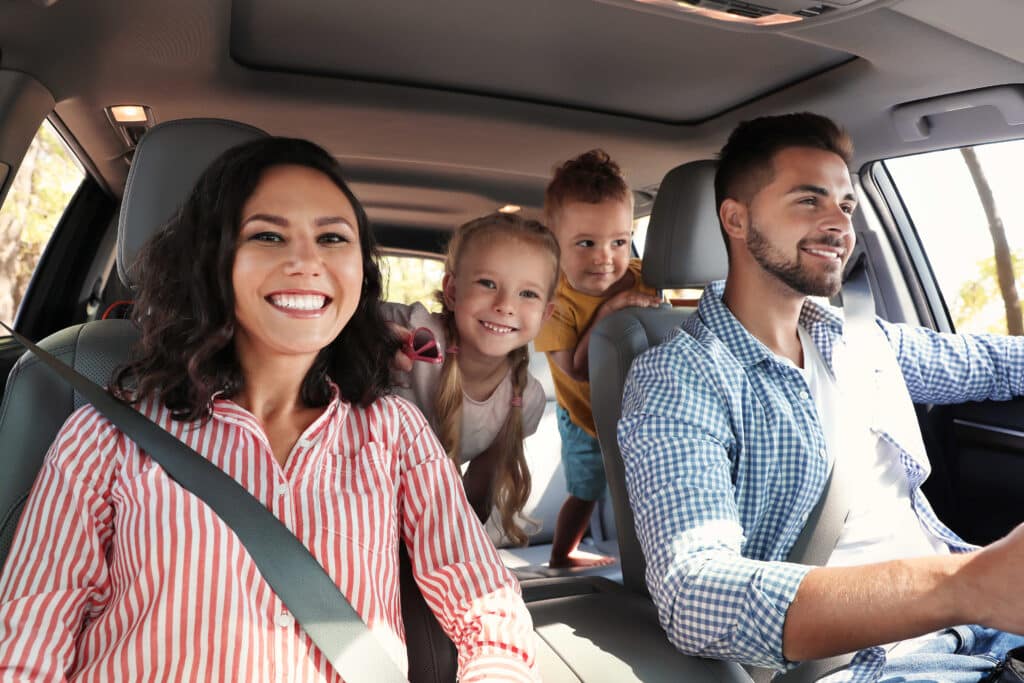 A family drives in the car