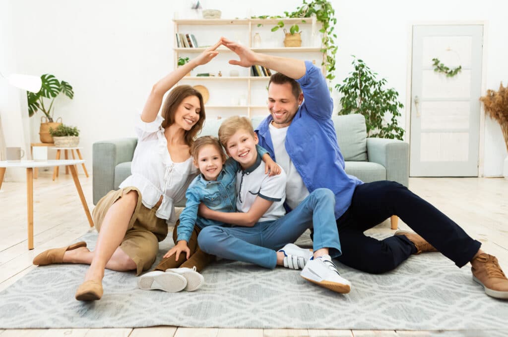 A family sits together at home