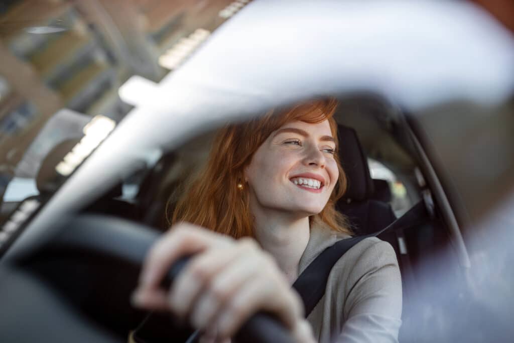 Woman driving in car