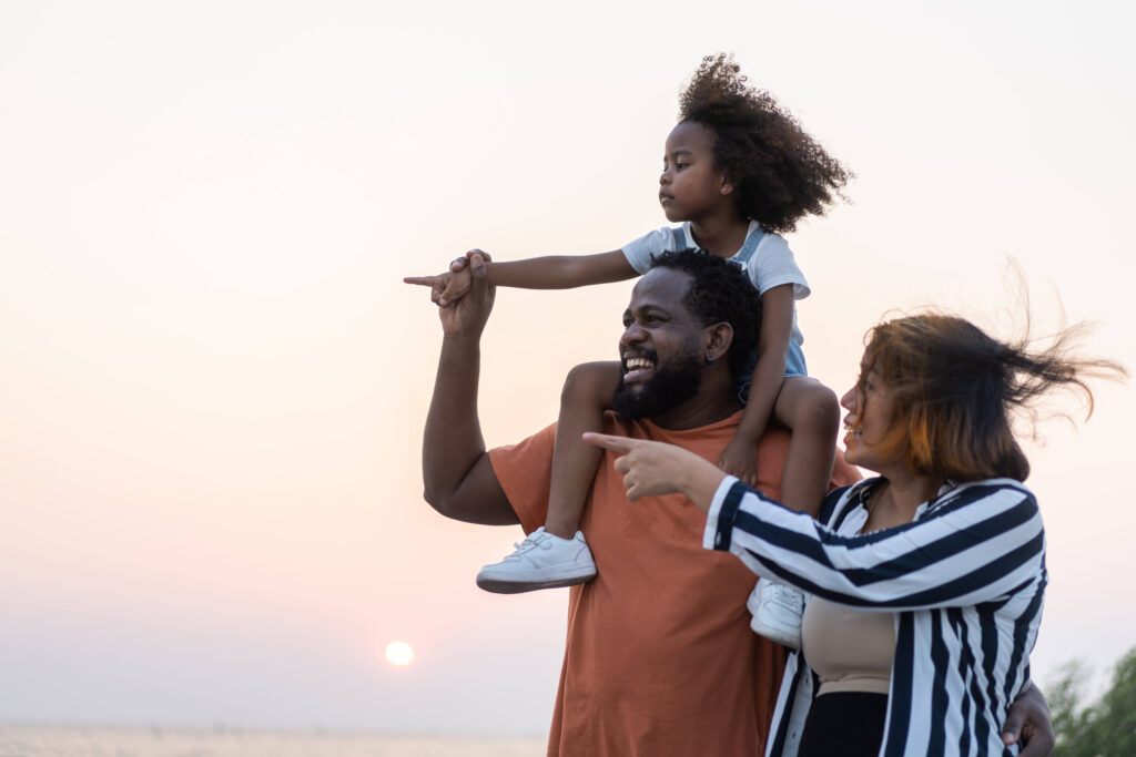 A family looks off into the horizon