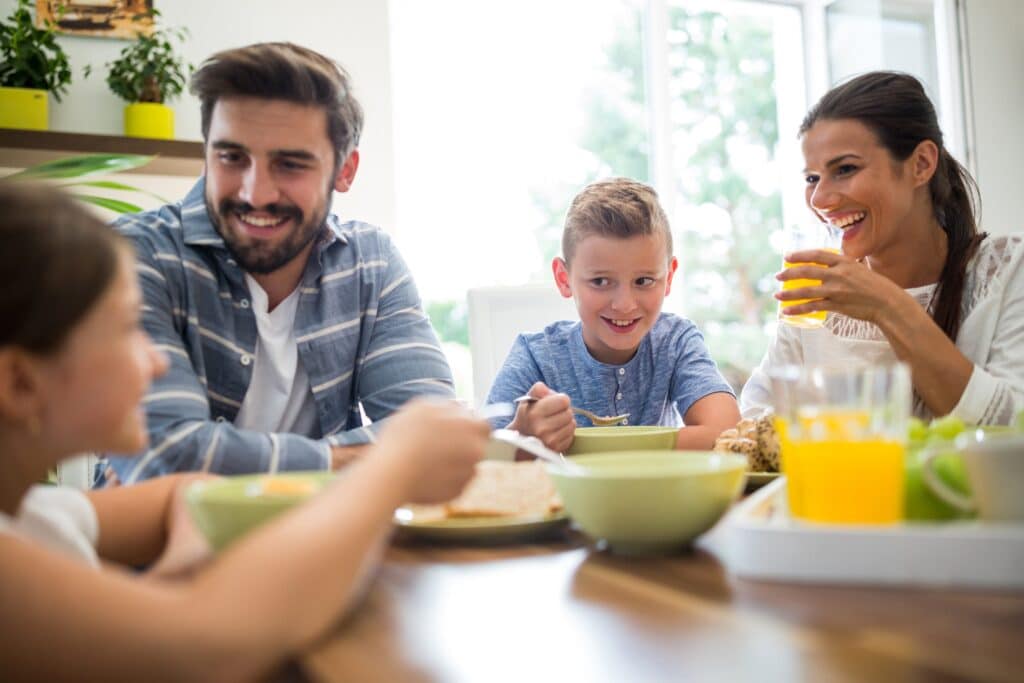 A family eating breakfast.