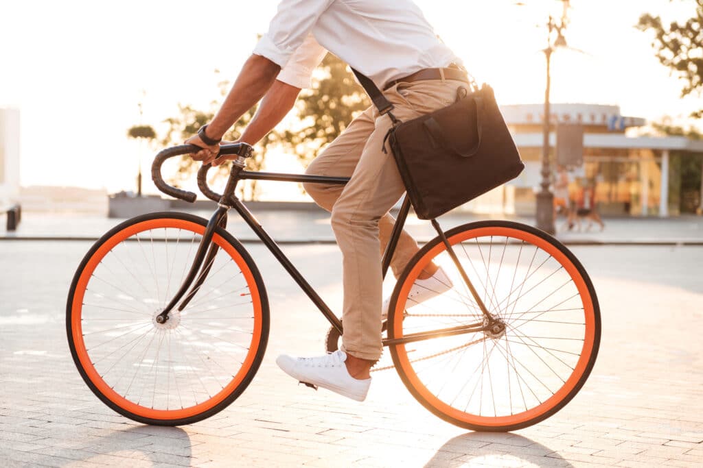 A man rides his bike to work.