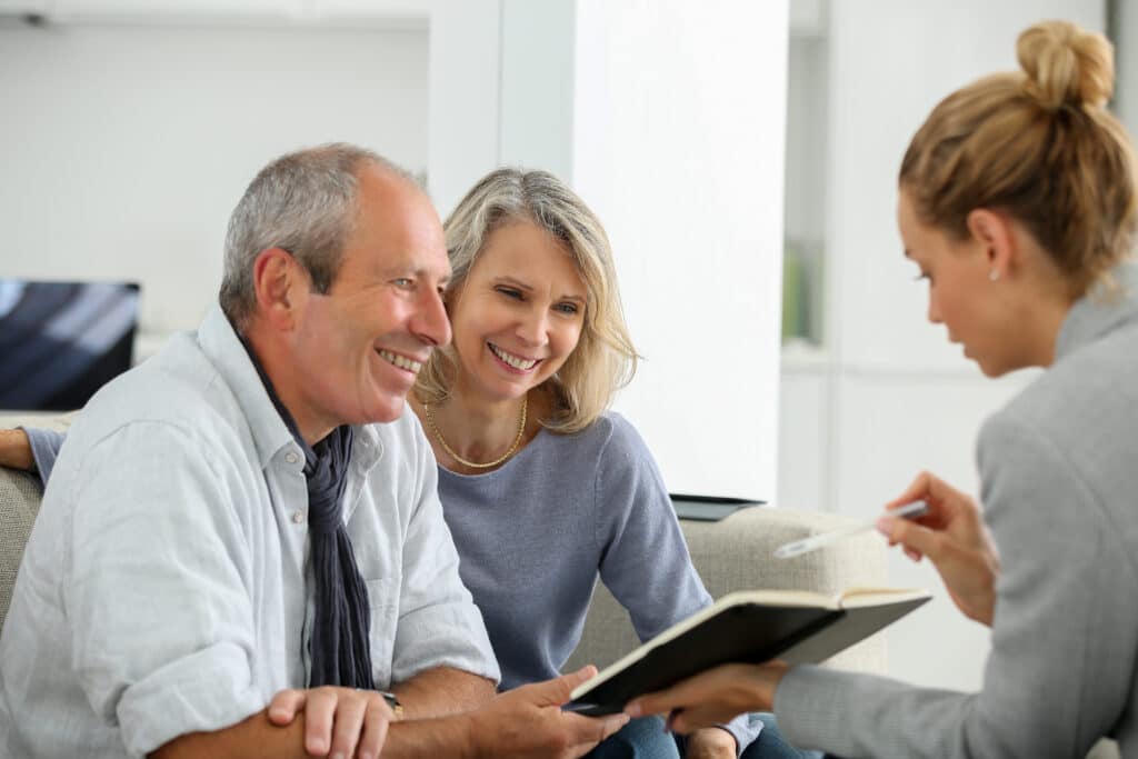 Couple meeting with insurance agent