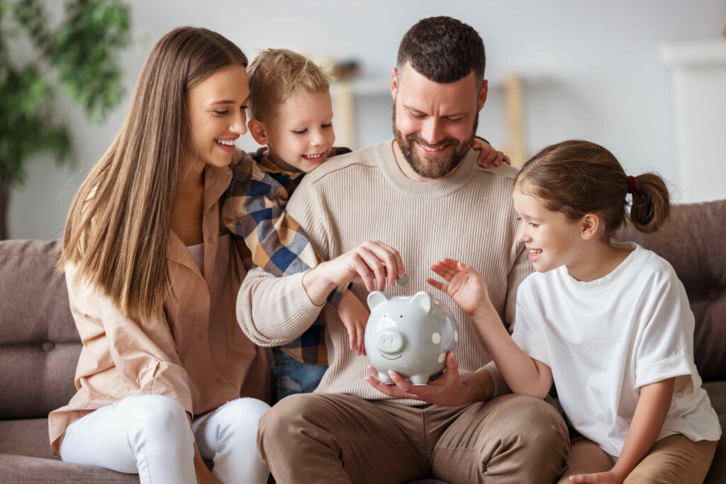 A family saves money in a piggy bank.