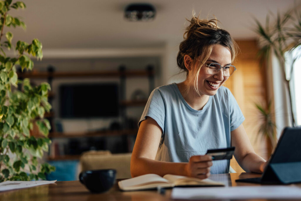 A woman works on her computer.