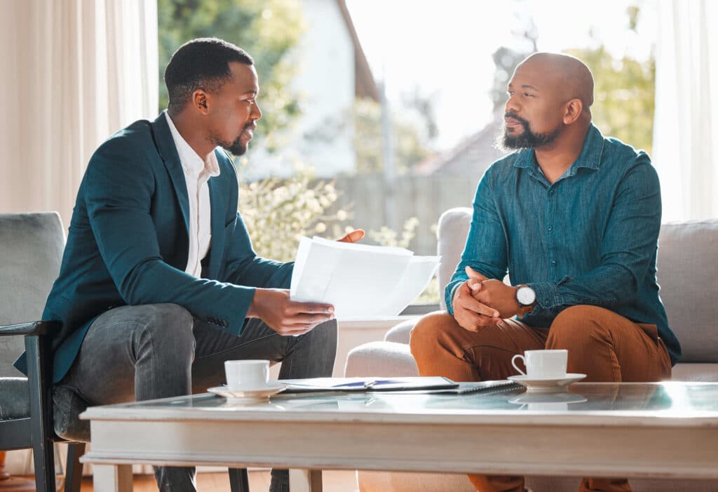 A customer meets with an insurance agent