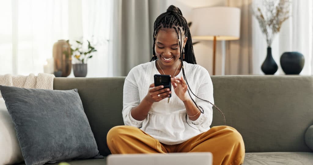 A woman uses her smartphone.